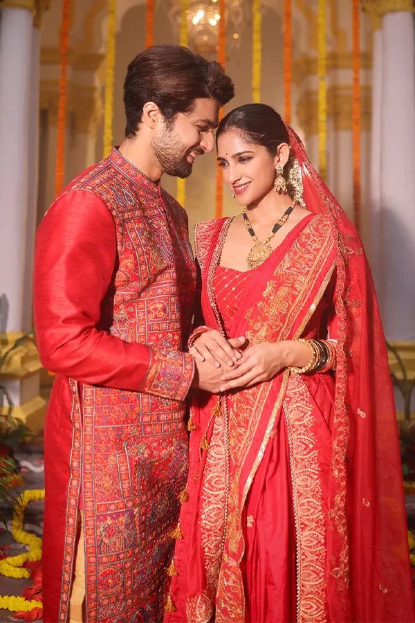 APSARA || BESPOKE RED BRIDAL WEDDING SAREE Hover