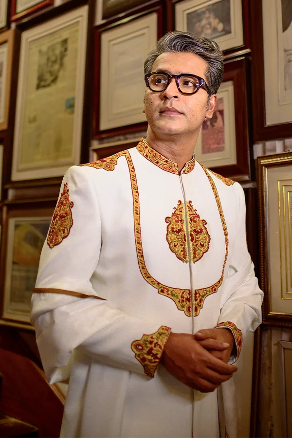 MAHARAJA IVORY TRADITIONAL EMBROIDERED DESIGNER SHERWANI SET Hover