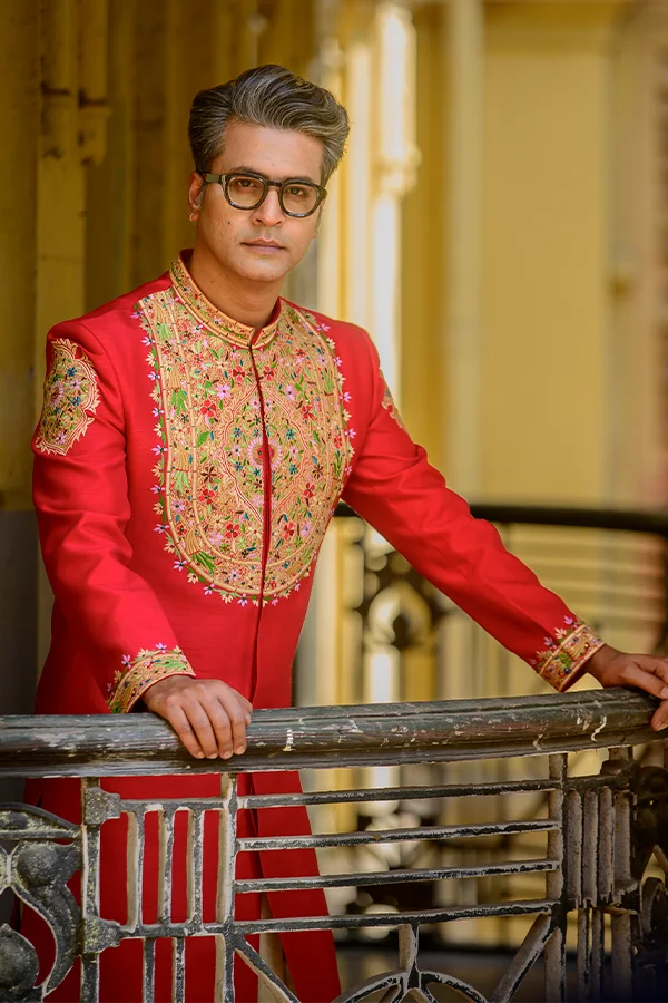 MAHARAJA RED EMBELLISHED DESIGNER SHERWANI SET Hover