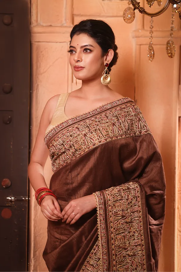 SAMRAGYI || BROWN HIEROGLYPHICS EMBROIDERED SAREE Hover